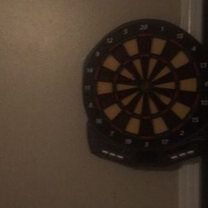 Dartboard comes with 10 darts